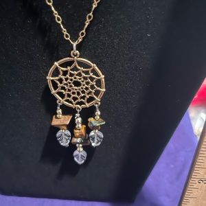 Dream catcher necklace in gold